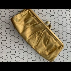 Vintage gold coach clutch